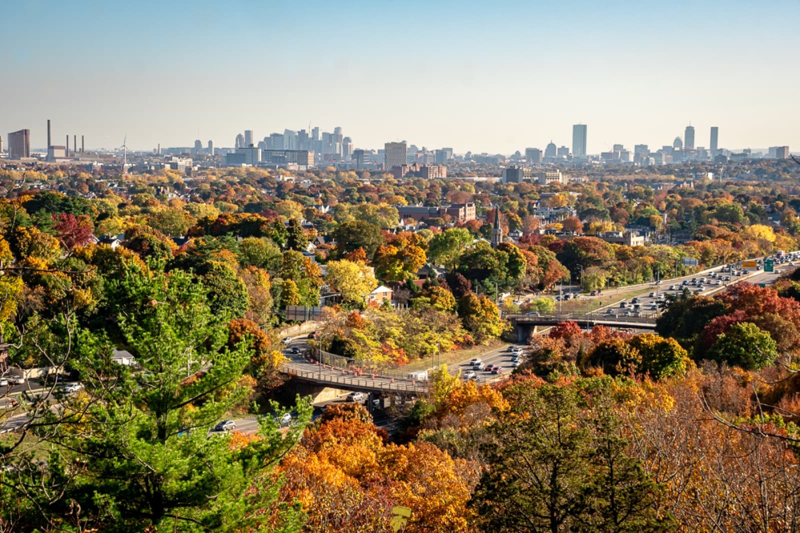A view from Wright’s Tower in the Middlesex Fells — fall foliage with the Boston skyline beyond