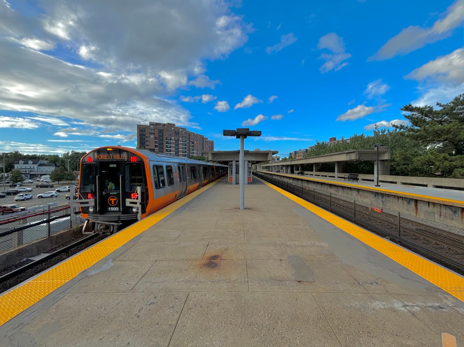An MBTA Orange Line train at the Malden Center station platform